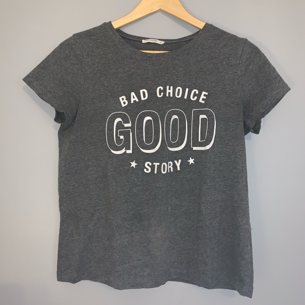 A grey short size large shirt🆕 with white letters